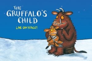 Gruffalos child image of the gruffalo holding the gruffalos child.