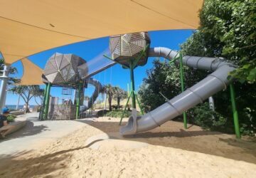 Shade sails and tunnel slide at Adventure Playground, Northern Parkland, Mooloolaba.