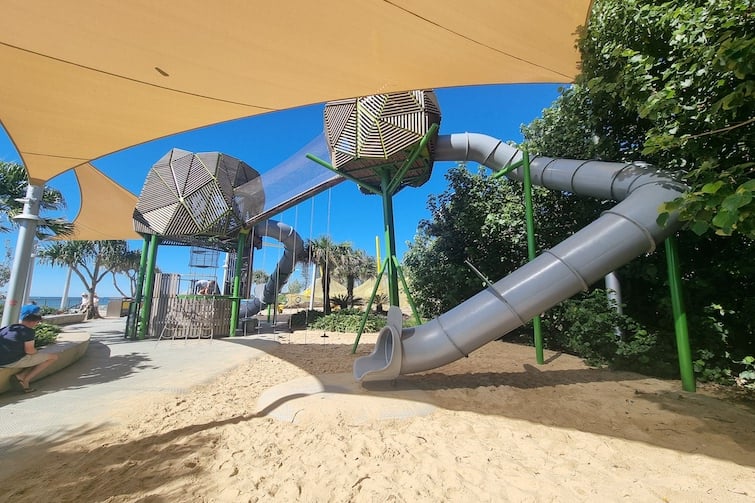 Shade sails and tunnel slide at Adventure Playground, Northern Parkland, Mooloolaba.