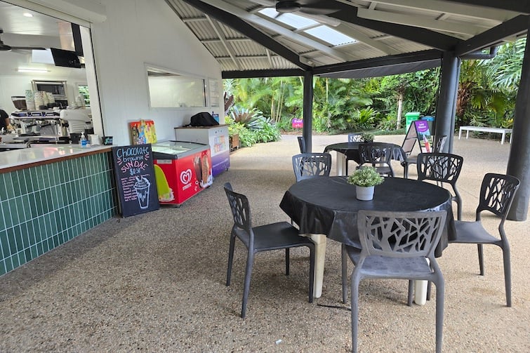 Outdoor cafe seating area at Amaze World.