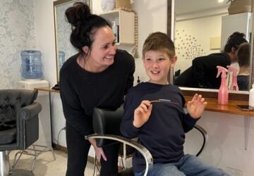 Giggles & Scissors boy getting haircut.