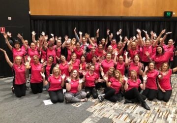 Coastal Babysitters group of smiling babysitters.