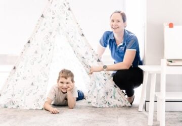 Early Start Australia Carissa and child in tent.