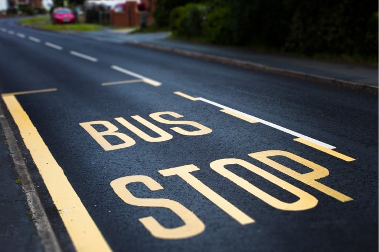 Bus stop painted on the road. 