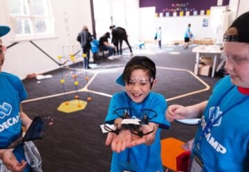 Code Camp group of students with drone.