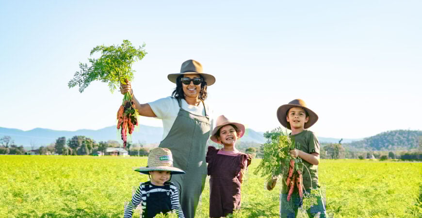 Est local month event mage of family in the carrot fields.
