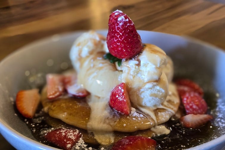 Pancakes with ice cream and strawberries at Granite Belt Christmas Farm.