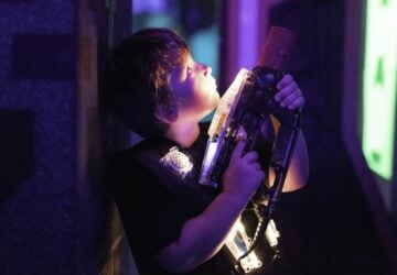 Laserzone young boy playing lasertag.