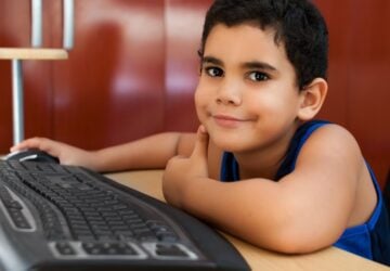 child learning to type.