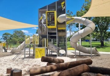 Tall fort with tunnel slides at Mabel Park.