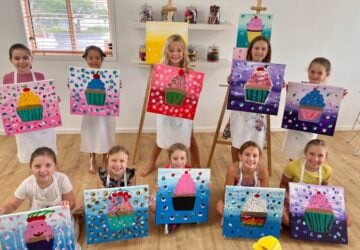 My Art Space Studio cupcake art class with completed artworks.