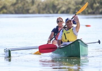 Nature Freedom canoeing duo on the water.