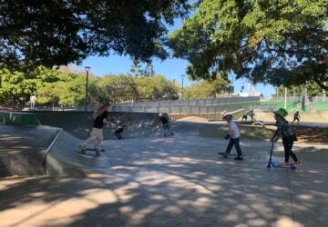 Kids skating and scootering at Paddington Skate Park.