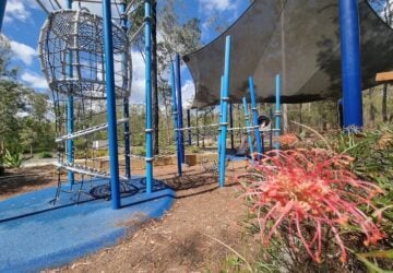 The bower play area and a flower at Peter Tullett Memorial Park.