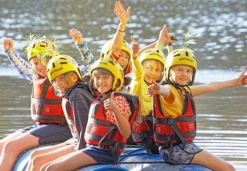 PGL Camp Kindilan group of students on raft.