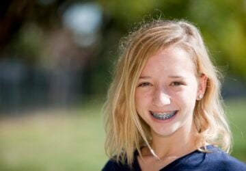 anxious teenager with braces wanting a job.