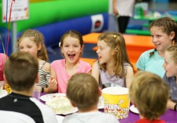 Urban Xtreme party kids at table.